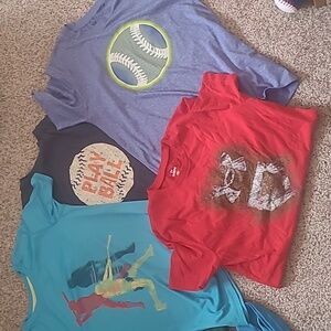 Lots of boy's baseball shirts